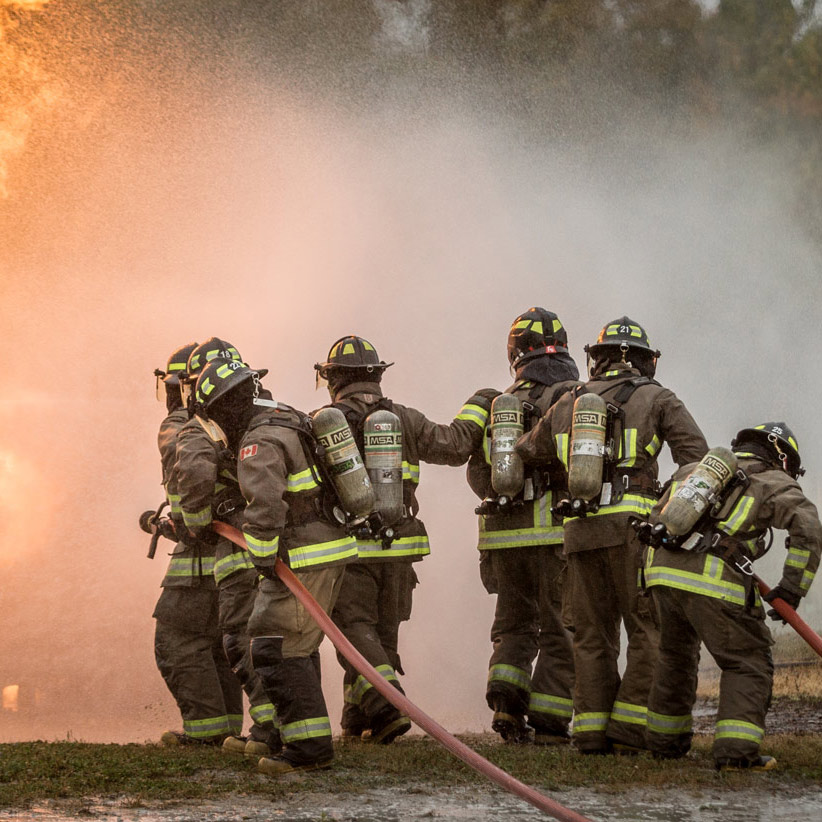 Portable Fire Extinguisher Putting Out Fire